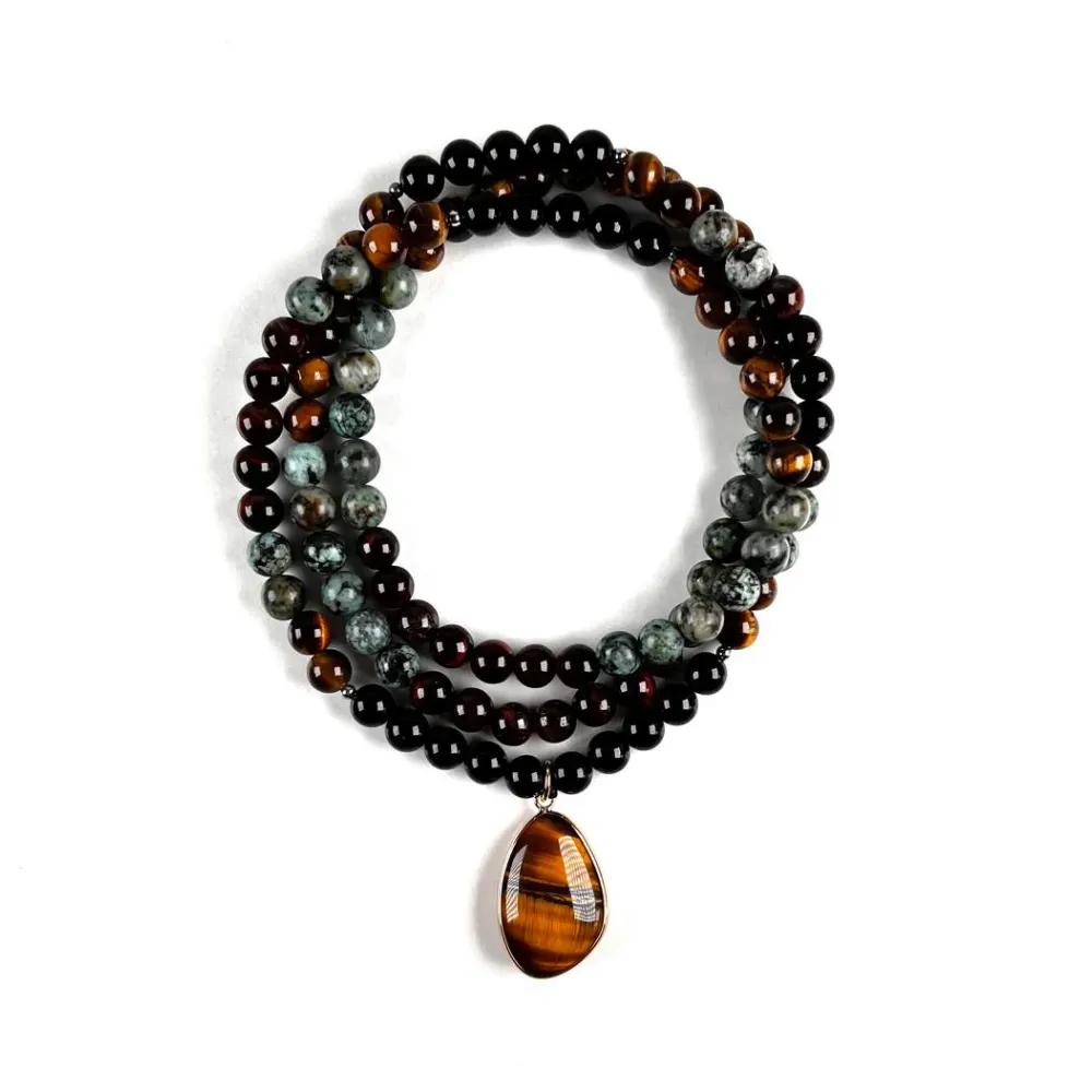 Collar de Intención Ónix y Turquesa Africana con Dije Ojo de Tigre